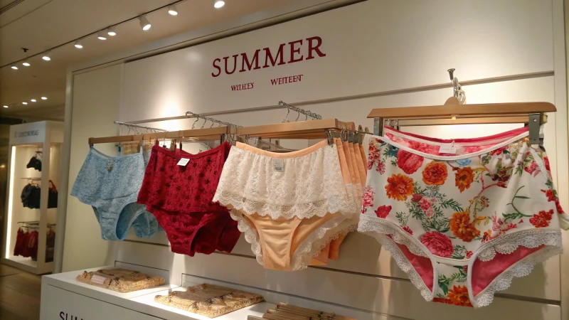 A display of custom underwear arranged by season, showcasing vibrant summer colors and warm winter tones.
